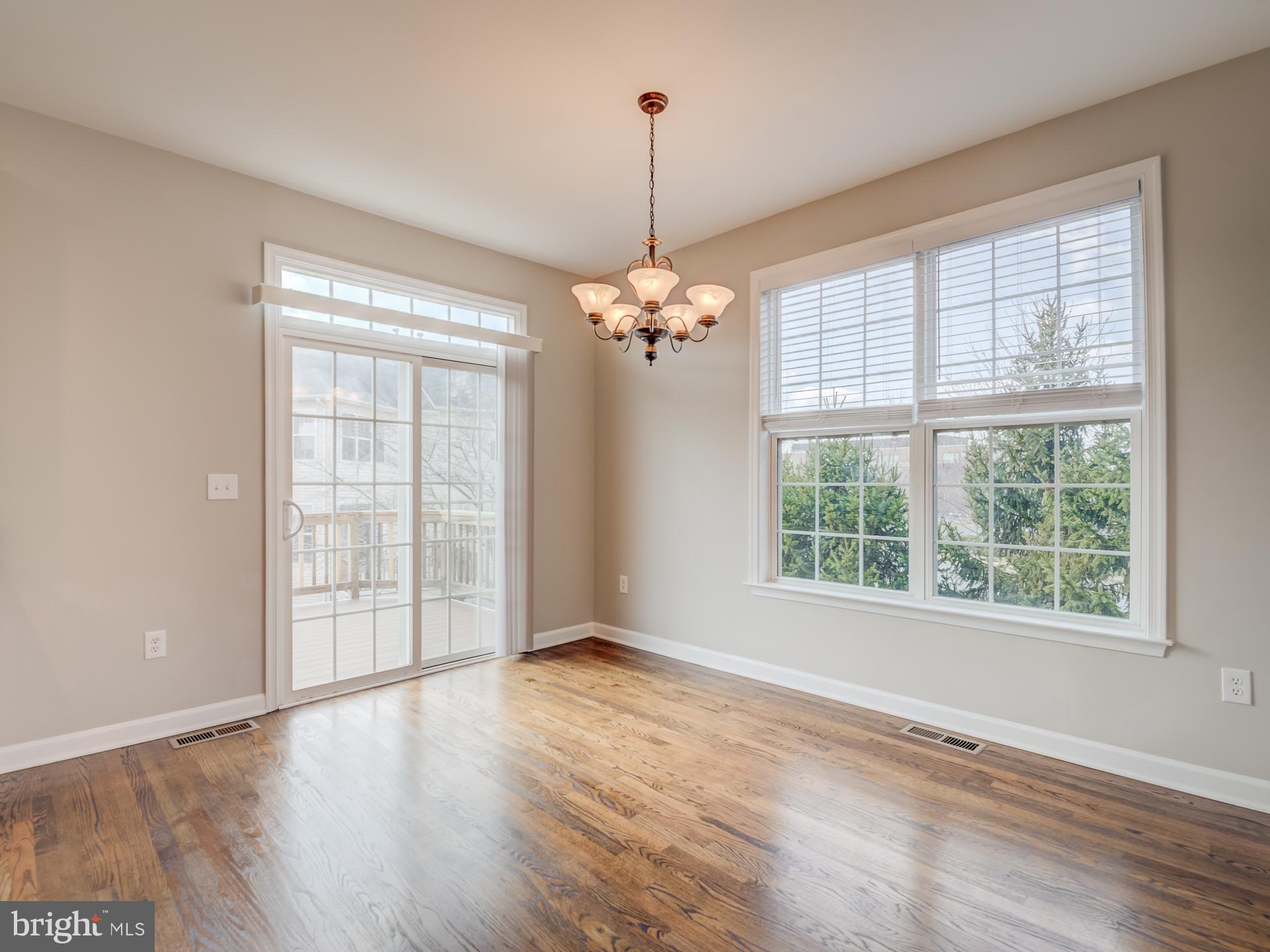 42451 Magellan Square Brambleton, VA 20148 - Photo 18 of 45 Eat-In Area Opens to Large Deck