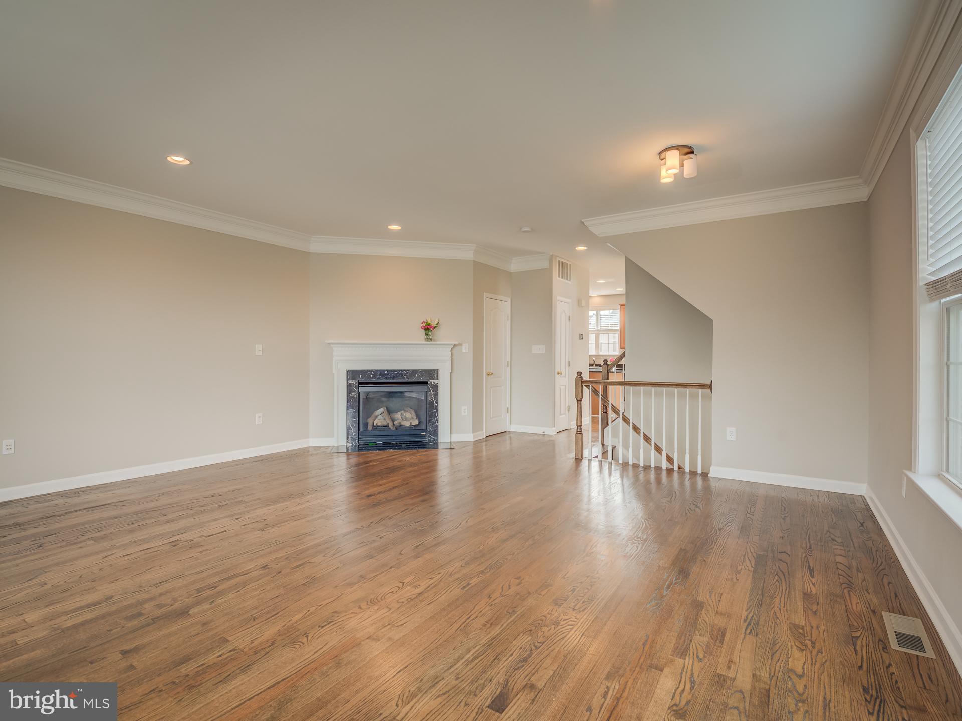 42451 Magellan Square Brambleton, VA 20148 - Photo 5 of 45 Hardwood Floors Throughout