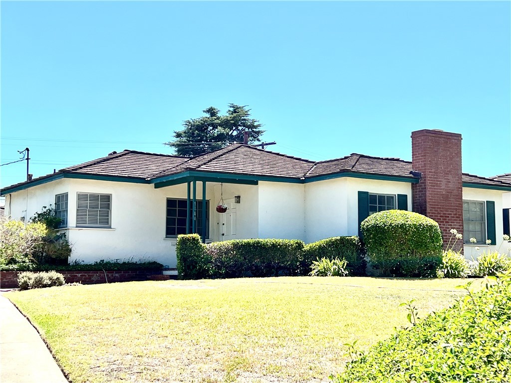 1100 Drake Road Arcadia, CA 91007 - Photo 1 of 21 a front view of a house with a yard and garage
