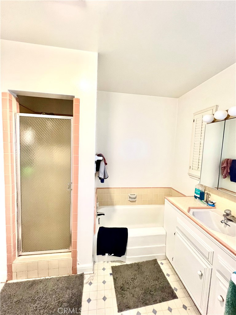 1100 Drake Road Arcadia, CA 91007 - Photo 11 of 21 a bathroom with a bathtub and a shower