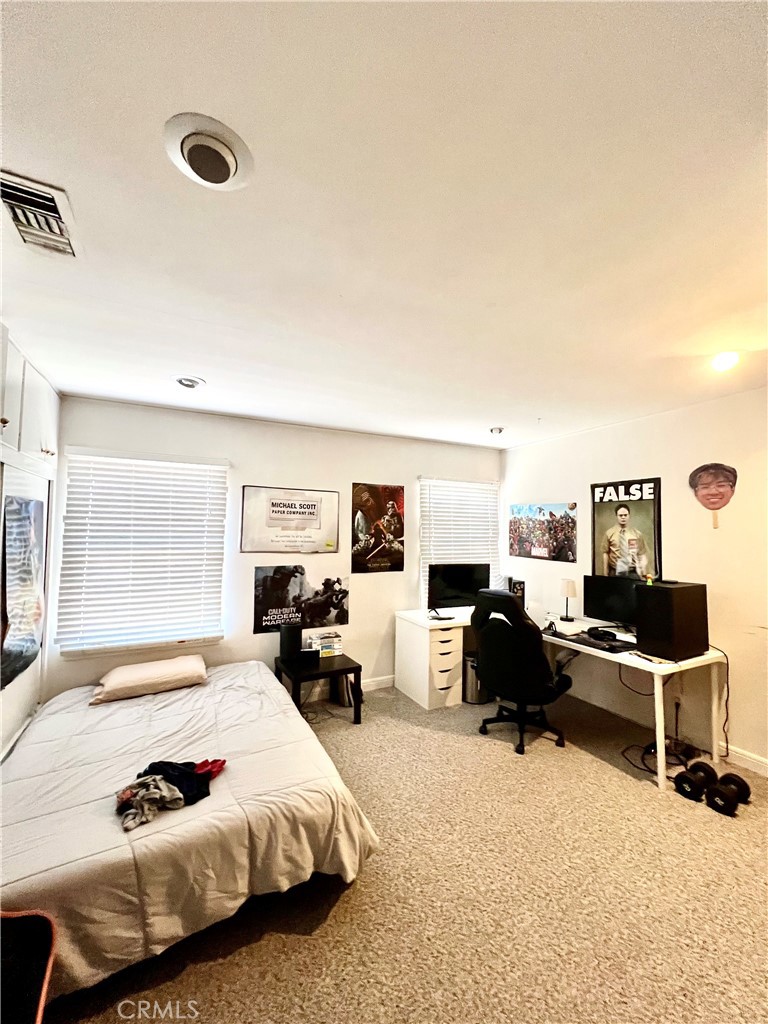 1100 Drake Road Arcadia, CA 91007 - Photo 12 of 21 a bedroom with a bed and a desk