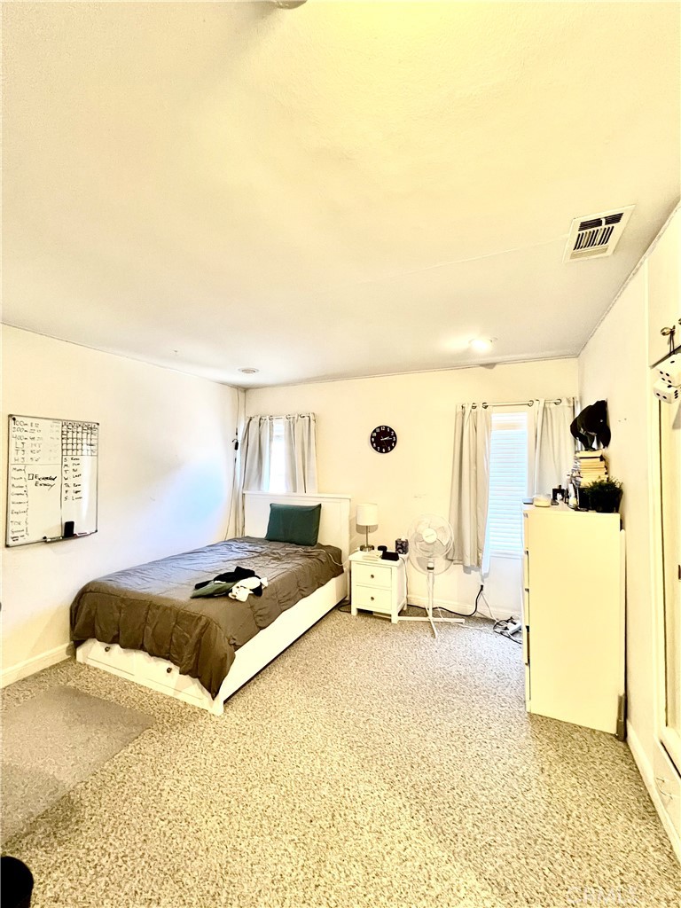 1100 Drake Road Arcadia, CA 91007 - Photo 13 of 21 a bedroom with furniture and a window