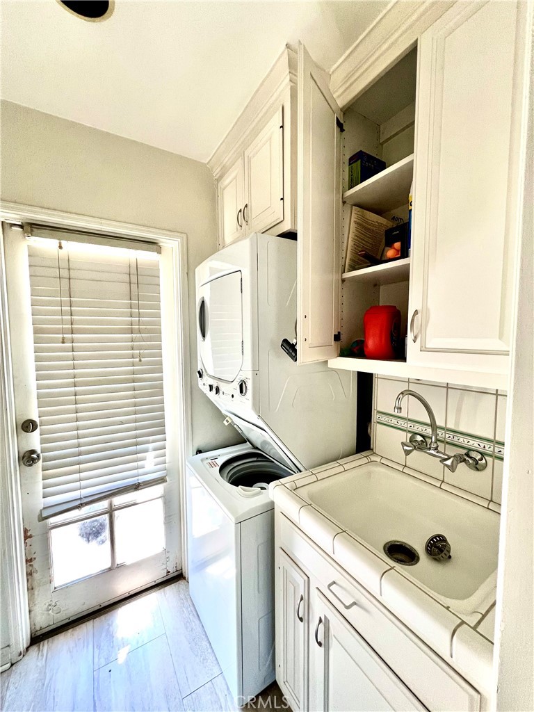 1100 Drake Road Arcadia, CA 91007 - Photo 5 of 21 a kitchen with a stove and a sink