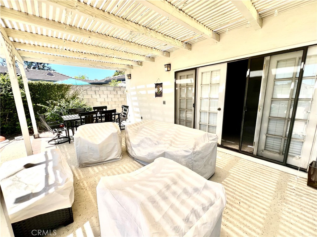 1100 Drake Road Arcadia, CA 91007 - Photo 10 of 21 a large bed sitting in a bedroom next to a window