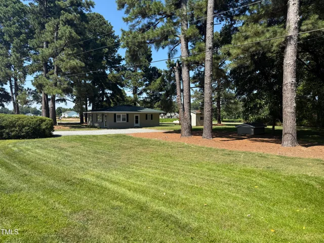 a view of swimming pool with trees