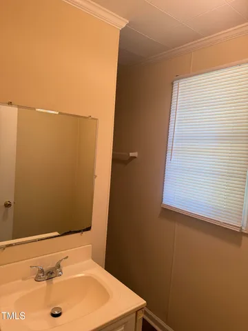 a bathroom with a sink and a tub