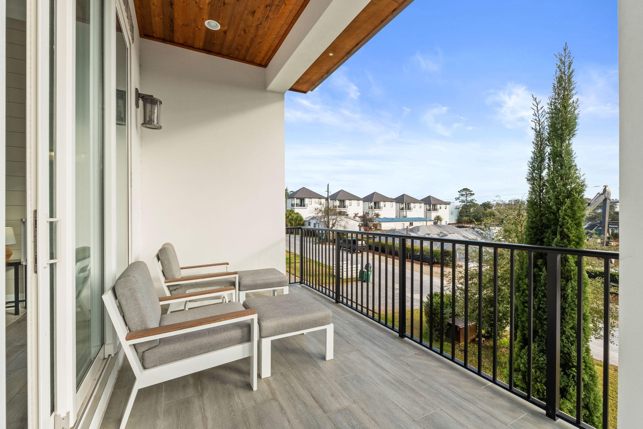 17 Penny Lane Santa Rosa Beach, FL 32459 - Photo 42 of 91 a view of a balcony with wooden chairs