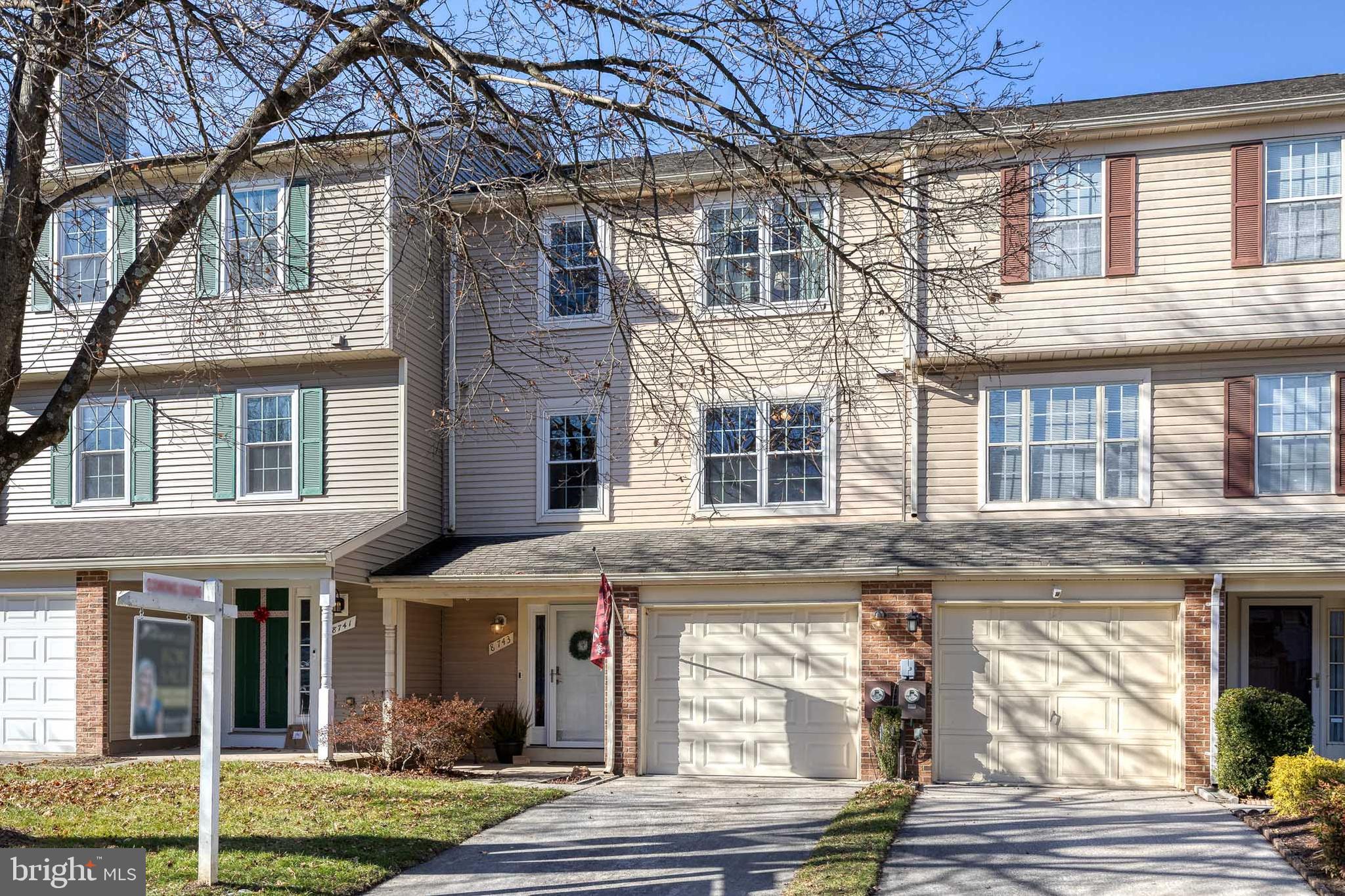 8743 Ruppert Court Ellicott City, MD 21043 - Photo 2 of 41 a view of a building with a window and a tree