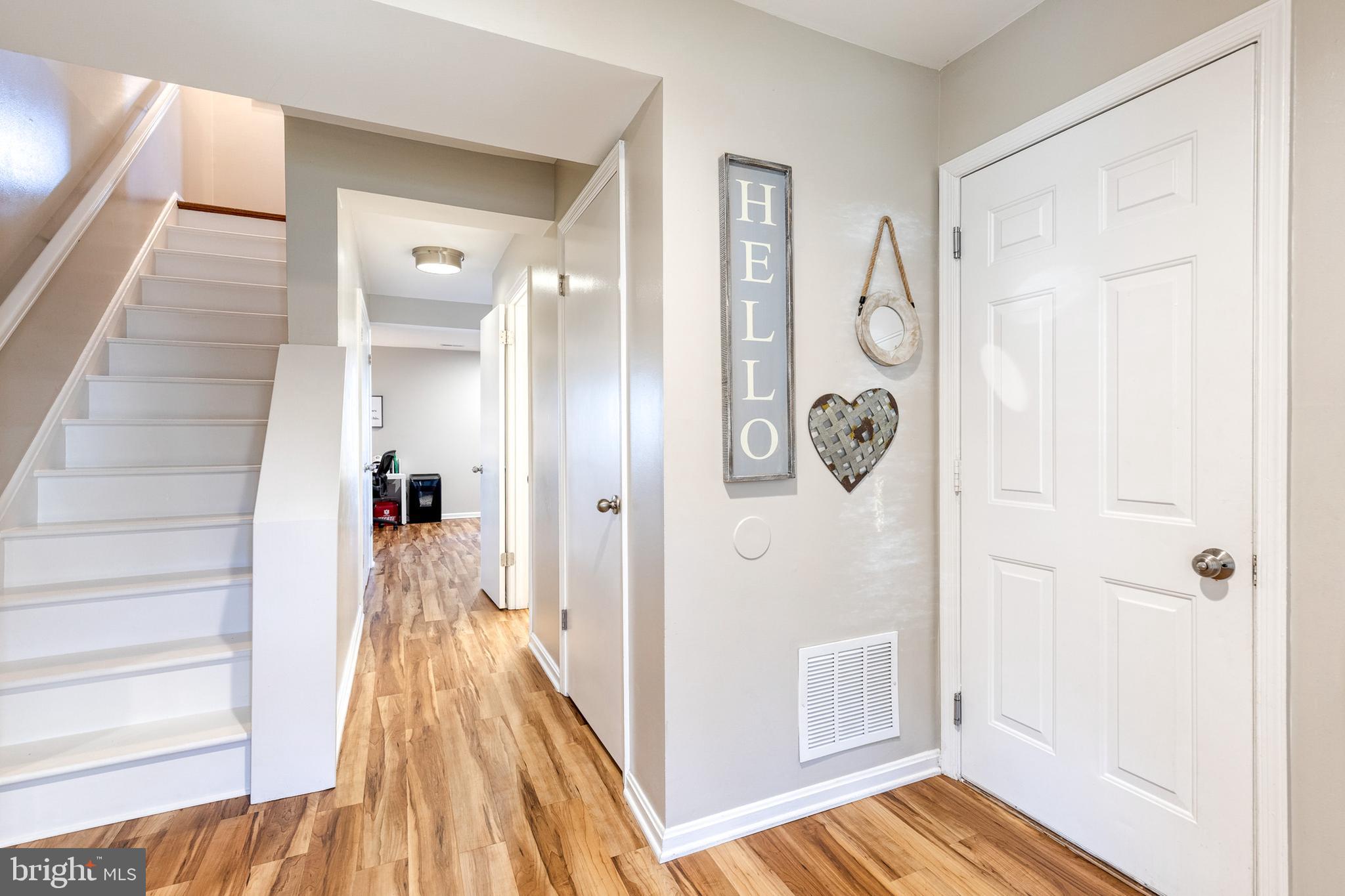 8743 Ruppert Court Ellicott City, MD 21043 - Photo 3 of 41 a view of a bathroom from the hallway