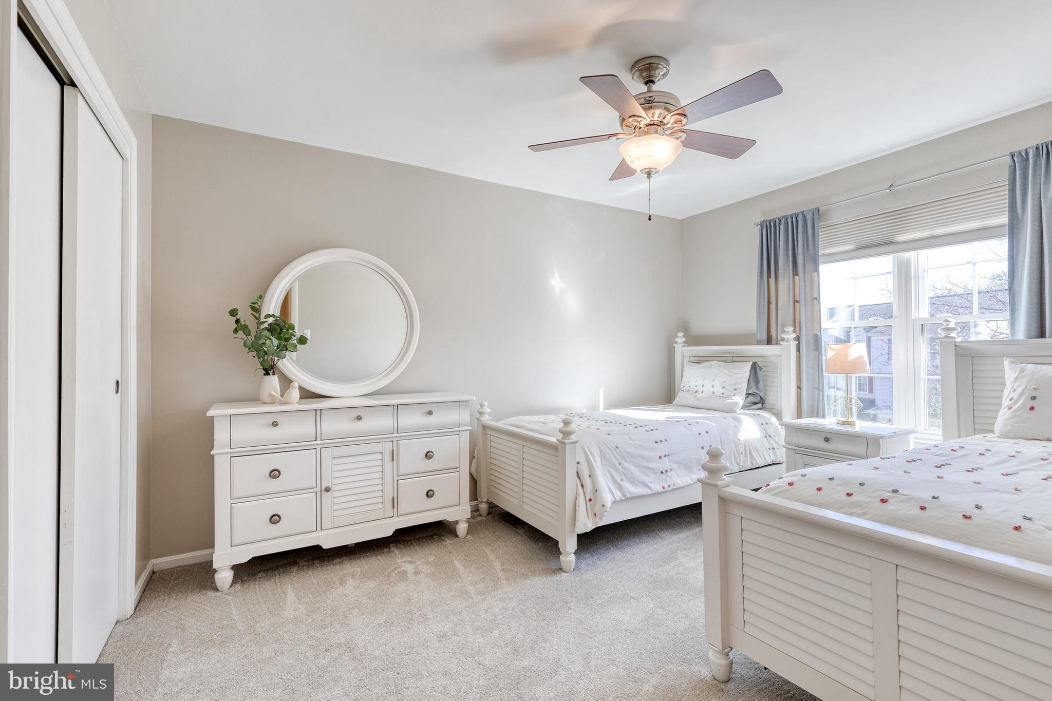 8743 Ruppert Court Ellicott City, MD 21043 - Photo 33 of 41 a bedroom with a bed and window