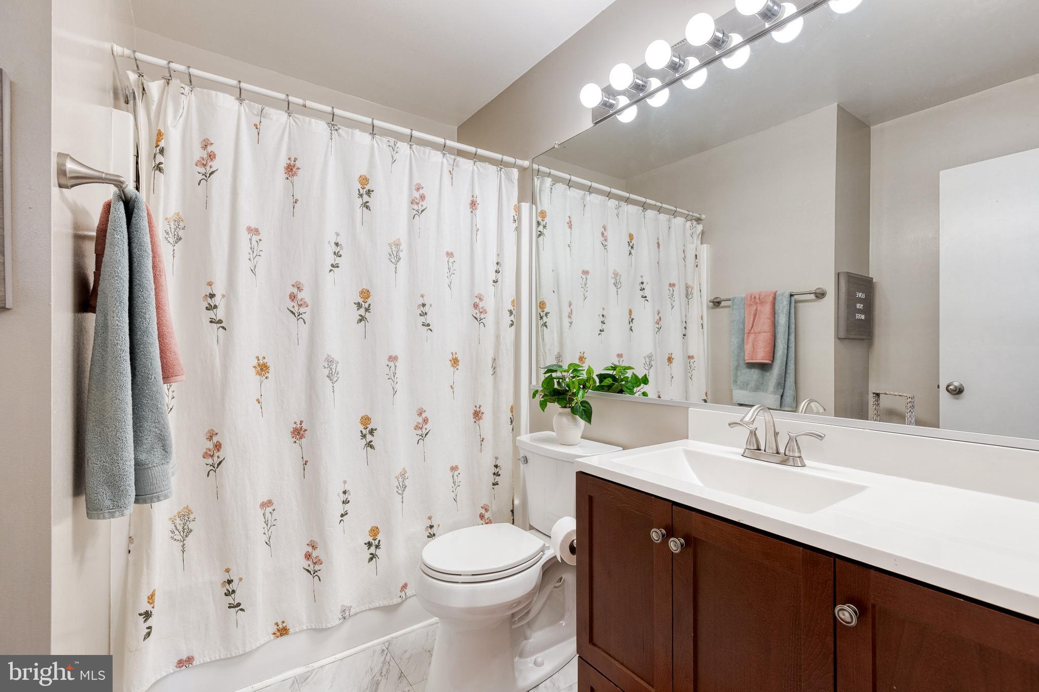 8743 Ruppert Court Ellicott City, MD 21043 - Photo 35 of 41 a bathroom with a sink vanity granite and toilet