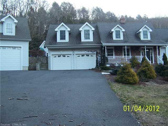 83 Squantuck Road Seymour, CT 06483 - Photo 1 of 1 a front view of a house with a yard