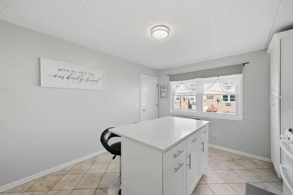 $245,000 | 5211 North Potawatomie Avenue, Unit 206, Chicago, IL 60656