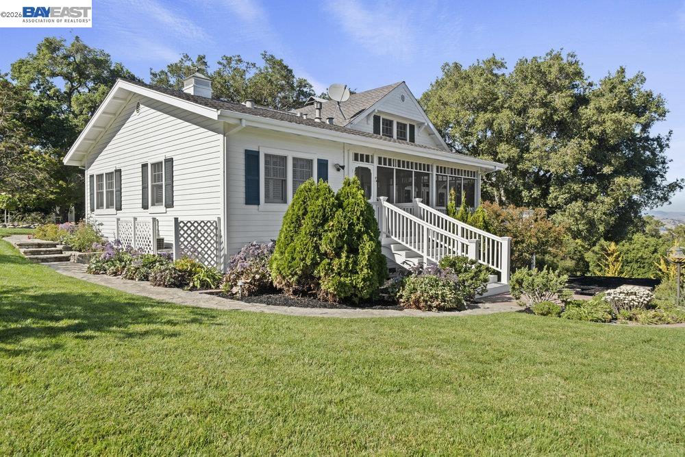 5280 Sheridan Road Sunol, CA 94586 - Photo 11 of 60 a front view of a house with a garden