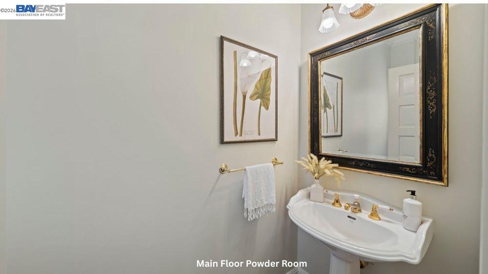 5280 Sheridan Road Sunol, CA 94586 - Photo 26 of 60 a bathroom with a sink and a mirror