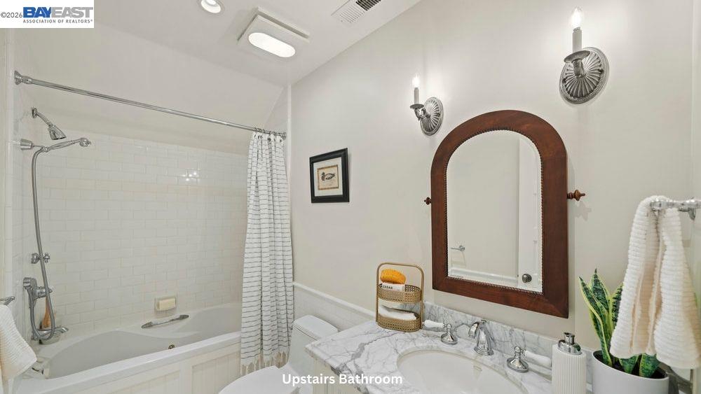 5280 Sheridan Road Sunol, CA 94586 - Photo 35 of 60 a bathroom with a granite countertop sink a toilet and shower
