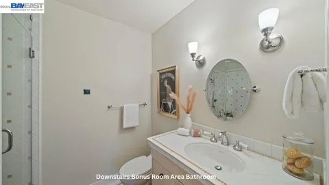 a bedroom with bed and window