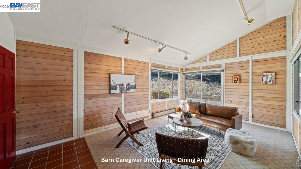 5280 Sheridan Road Sunol, CA 94586 - Photo 49 of 60 a living room with furniture a rug and a window