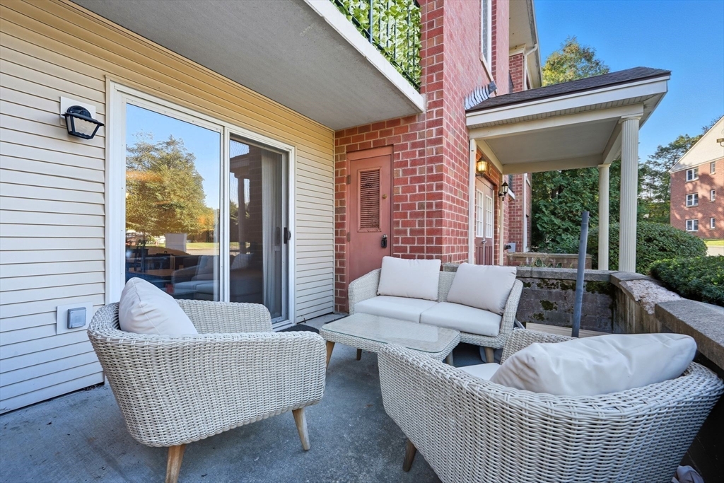 16 Maple Crest Circle, Unit B Holyoke, MA 01040 - Photo 19 of 24 a living room with furniture and a window