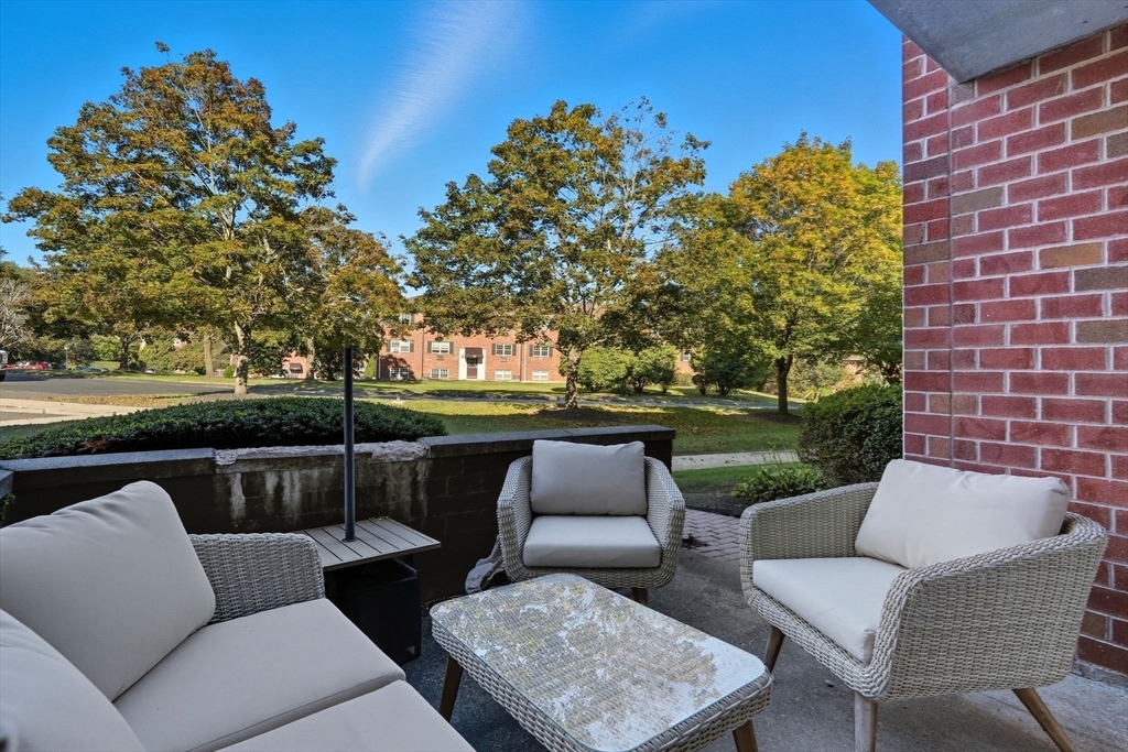 16 Maple Crest Circle, Unit B Holyoke, MA 01040 - Photo 20 of 24 a view of a patio with couches and a table