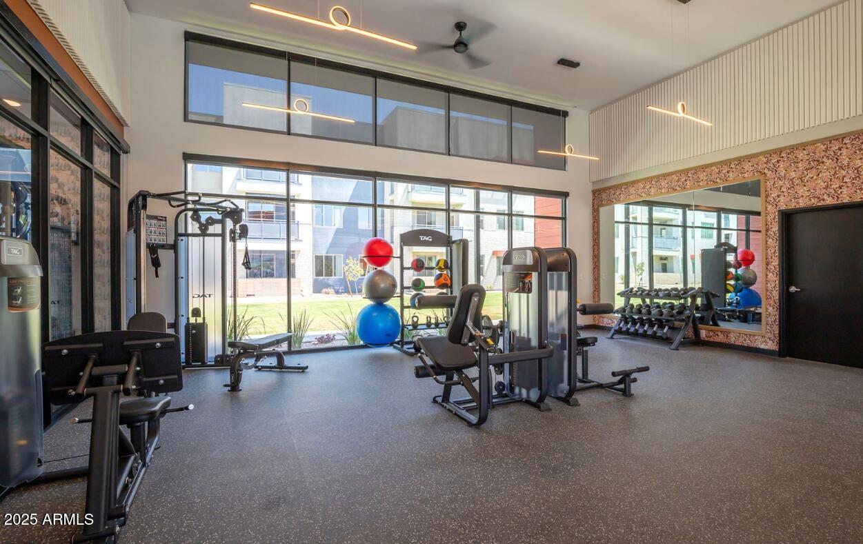2050 West Southern Avenue, Unit 1 Phoenix, AZ 85041 - Photo 7 of 13 a view of a room with gym equipment