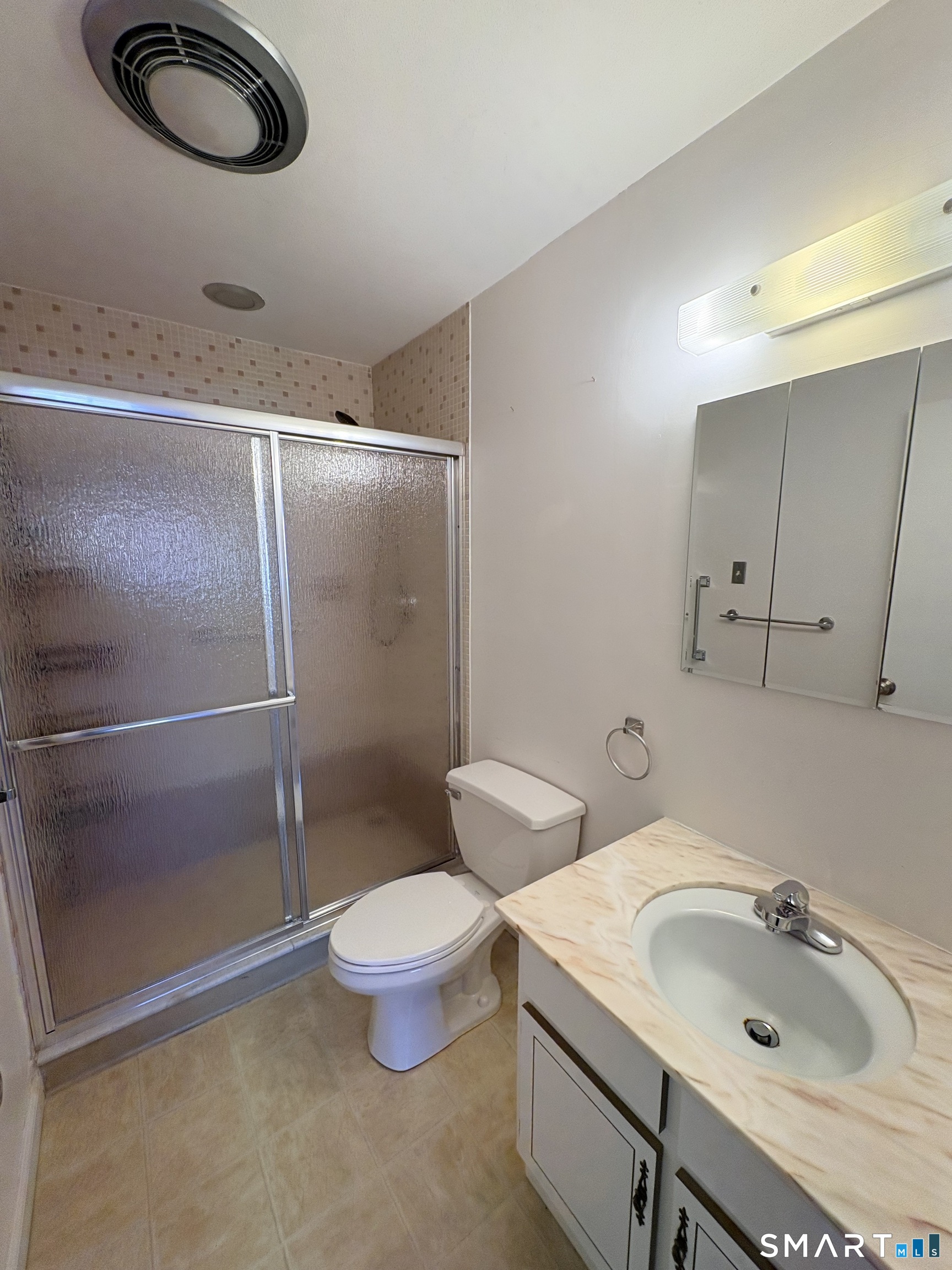 57 Westridge Road, Unit B9 New London, CT 06320 - Photo 11 of 13 a bathroom with a sink toilet and shower