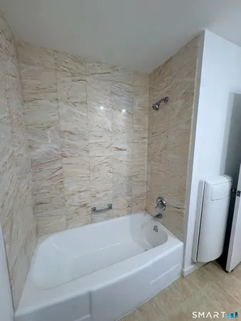 a bathroom with a bathtub