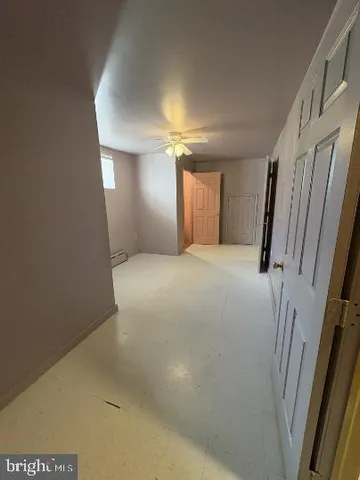 a view of a livingroom with a staircase