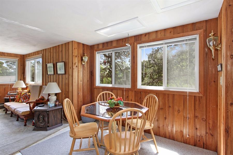 50 Indian Walk Road Wellfleet, MA 02667 - Photo 6 of 21 a view of a dining room with furniture window and outside view