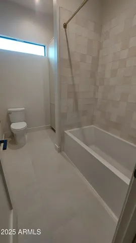 a view of yard with swimming pool and trees