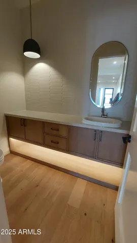 a stove top oven sitting inside of a kitchen