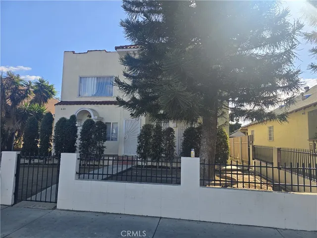 a view of a building with a street