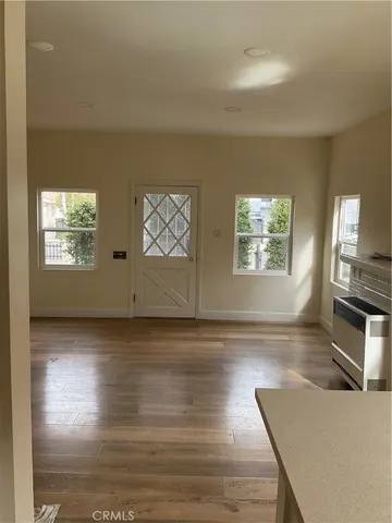 a view of a livingroom with wooden floor