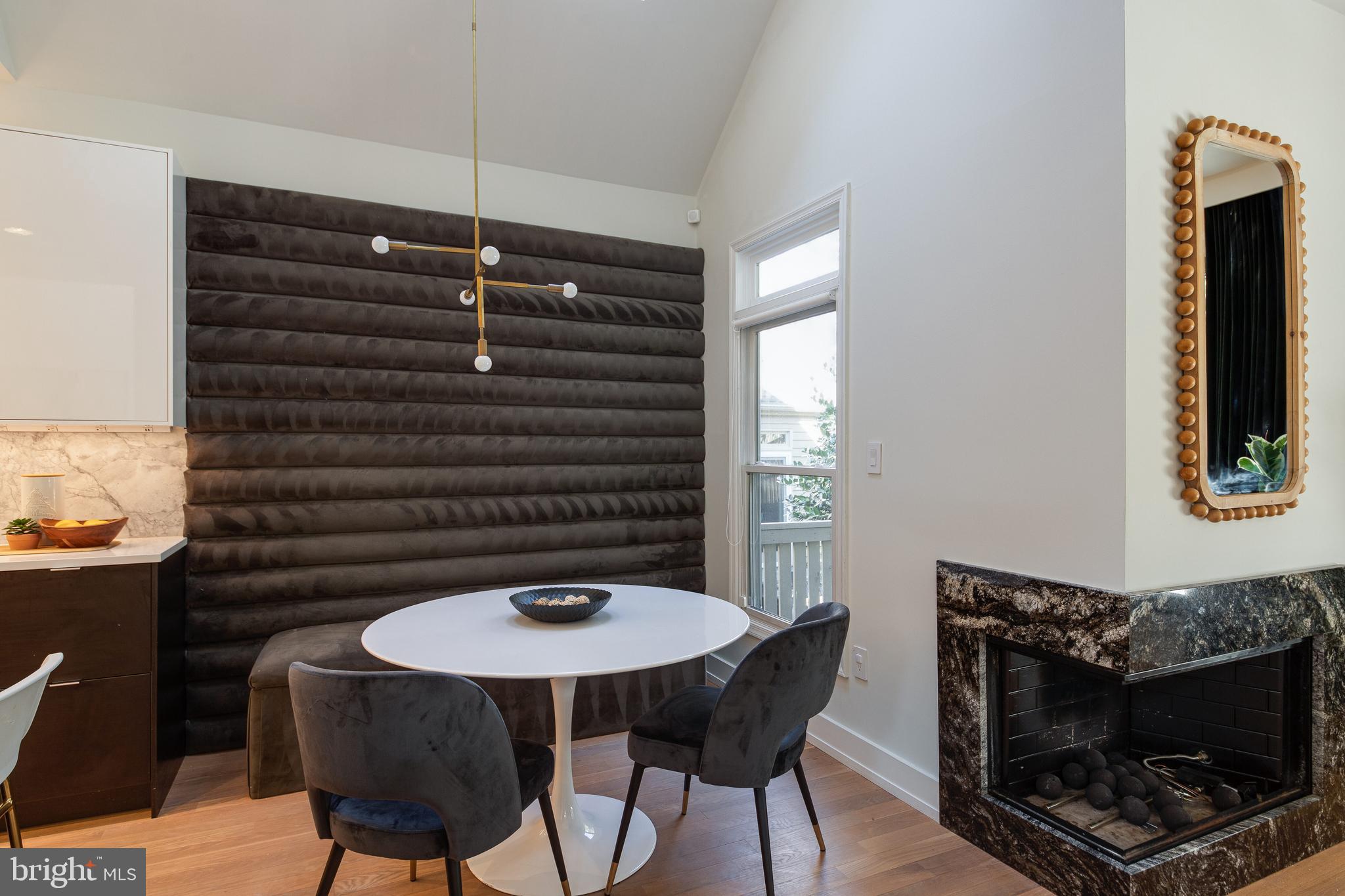 2009 Beacon Place Reston, VA 20191 - Photo 11 of 40 a kitchen with a table and chairs