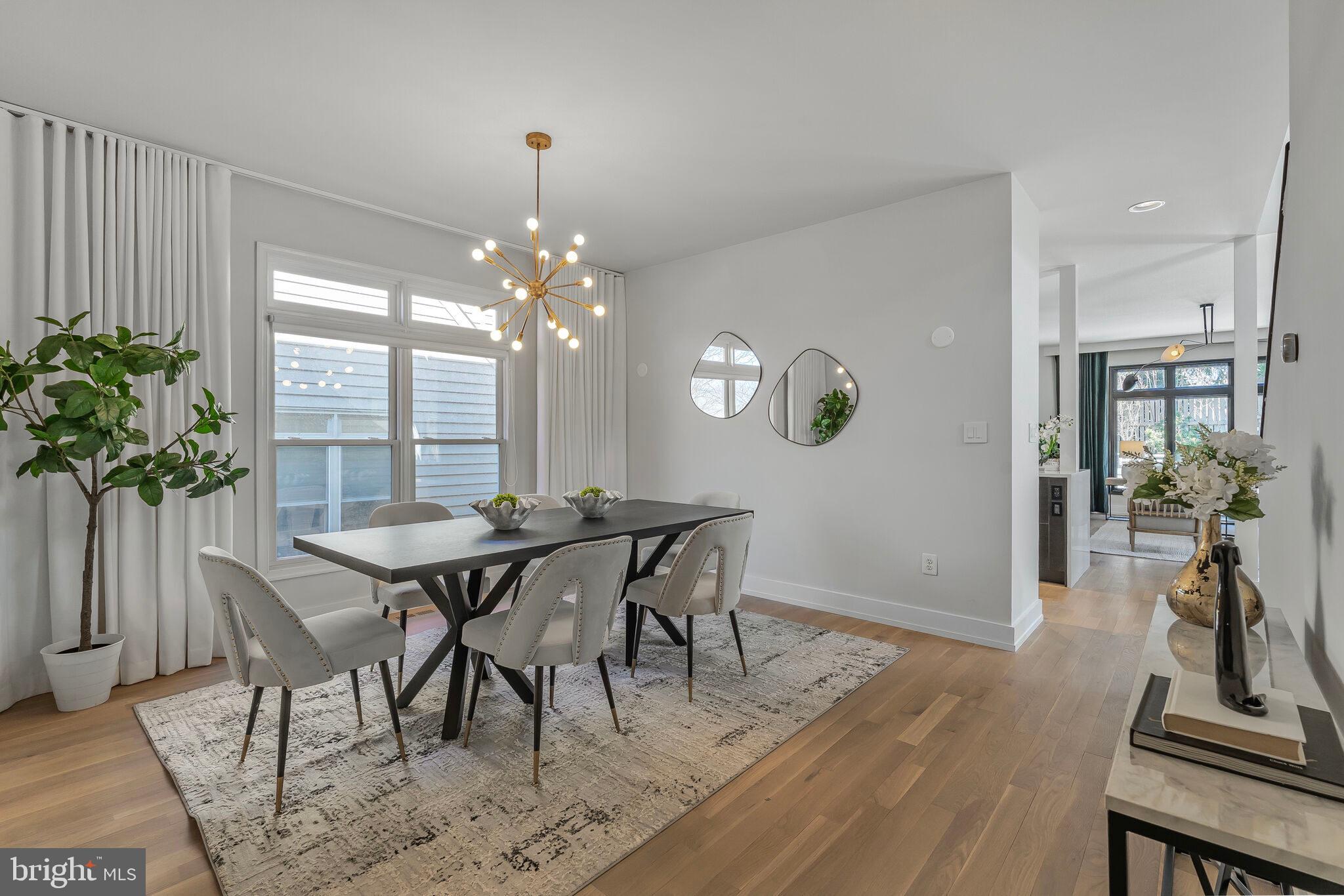 2009 Beacon Place Reston, VA 20191 - Photo 17 of 40 a view of a dining room with furniture window and wooden floor