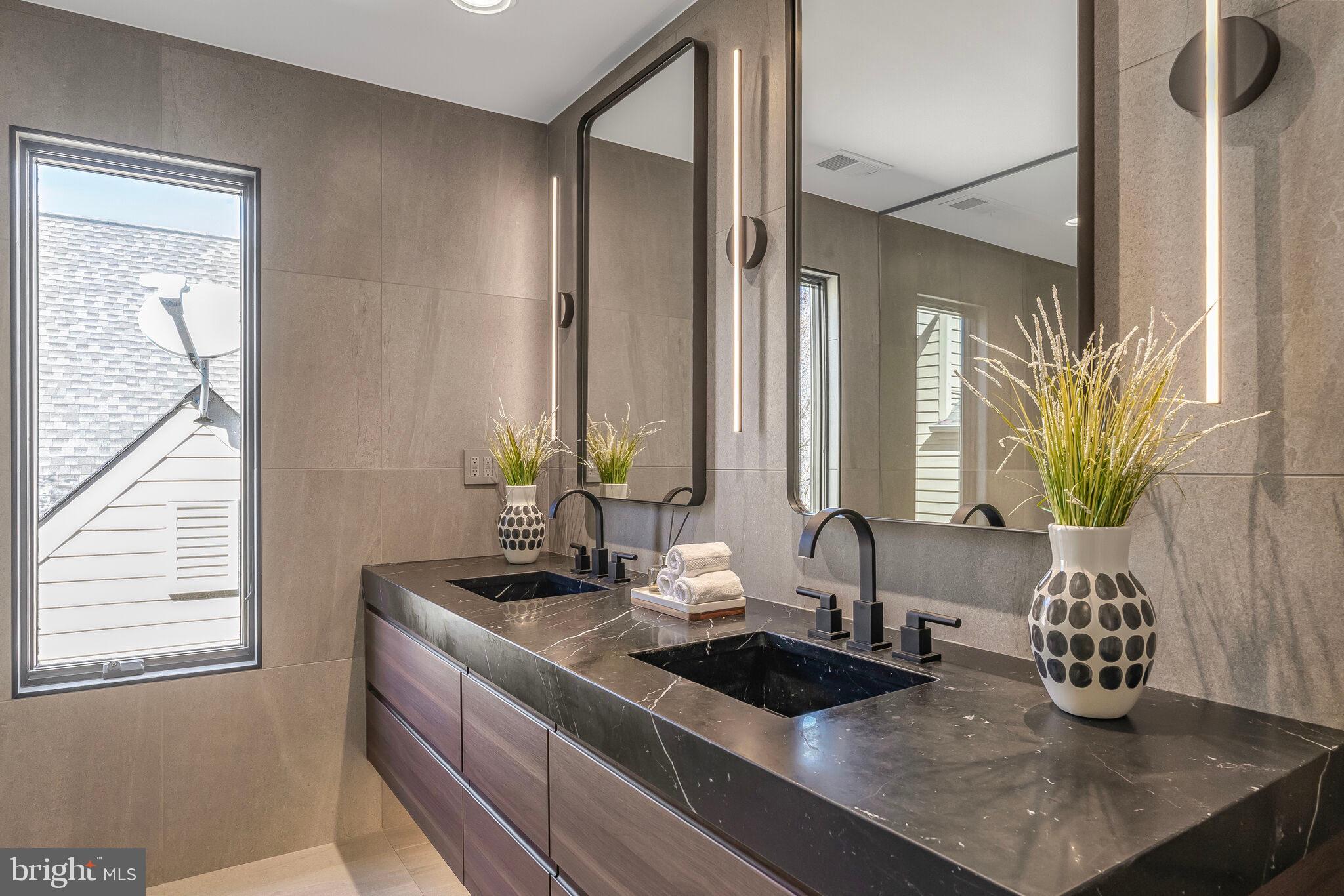 2009 Beacon Place Reston, VA 20191 - Photo 26 of 40 a view of a kitchen area with potted plants and wooden floor