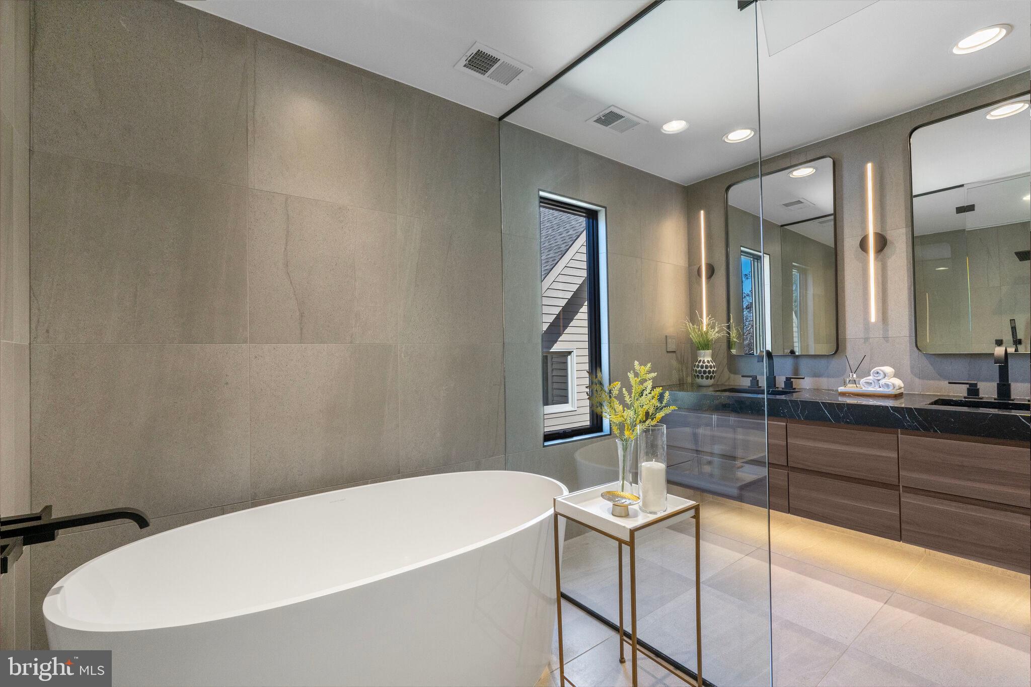 2009 Beacon Place Reston, VA 20191 - Photo 27 of 40 a bathroom with a bathtub and a sink