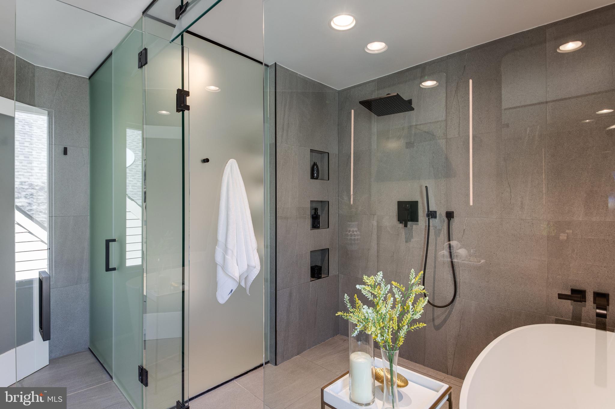2009 Beacon Place Reston, VA 20191 - Photo 29 of 40 a bathroom with a shower and a sink