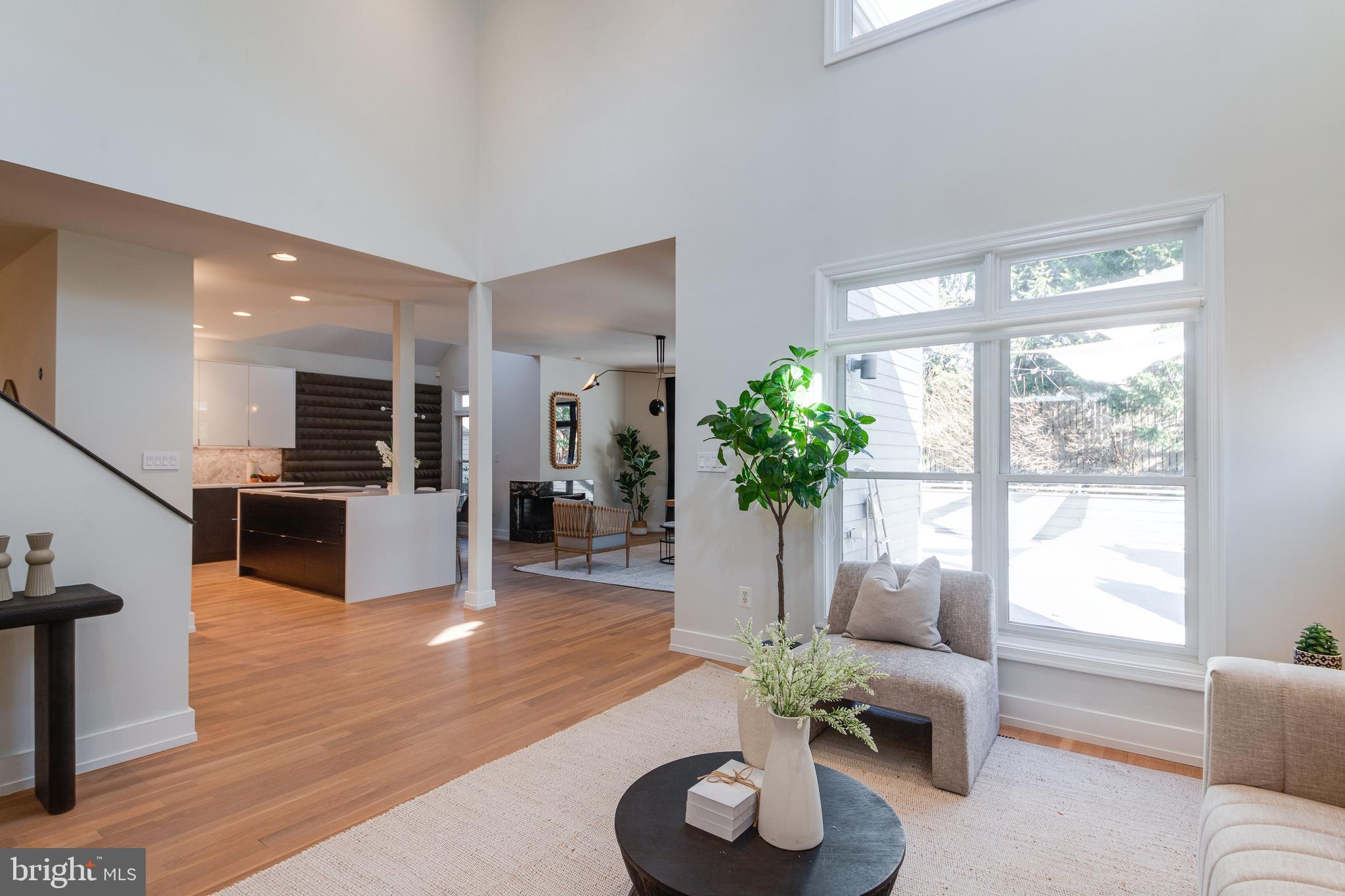 2009 Beacon Place Reston, VA 20191 - Photo 7 of 40 a living room with furniture kitchen and a large window
