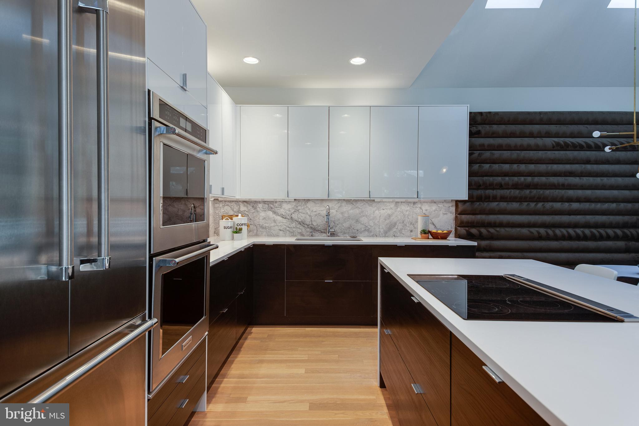 2009 Beacon Place Reston, VA 20191 - Photo 10 of 40 a kitchen with a sink and stainless steel appliances