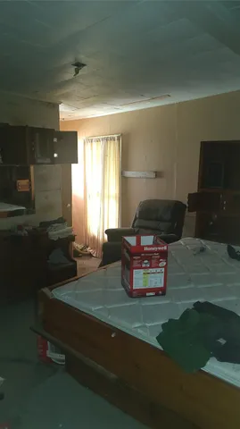 en suite bathroom with a sink and mirror