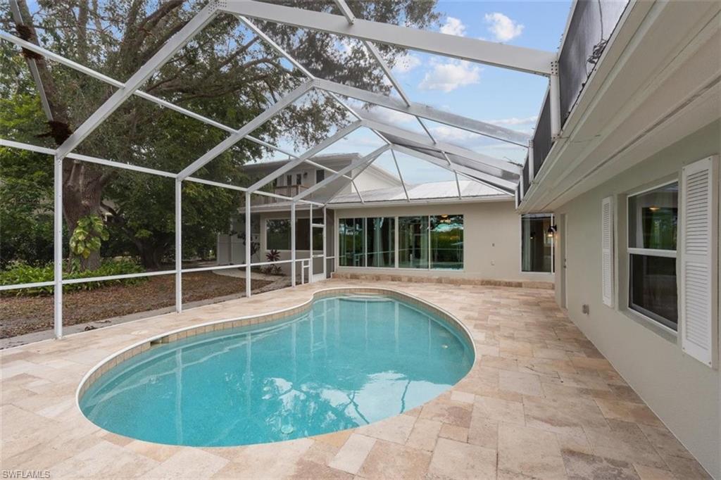 4851 Riverside Drive Estero, FL 33928 - Photo 26 of 35 a view of outdoor space yard swimming pool