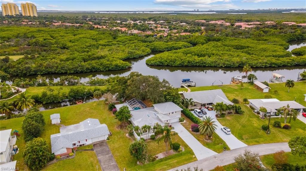 4851 Riverside Drive Estero, FL 33928 - Photo 34 of 35 an aerial view of residential houses with outdoor space