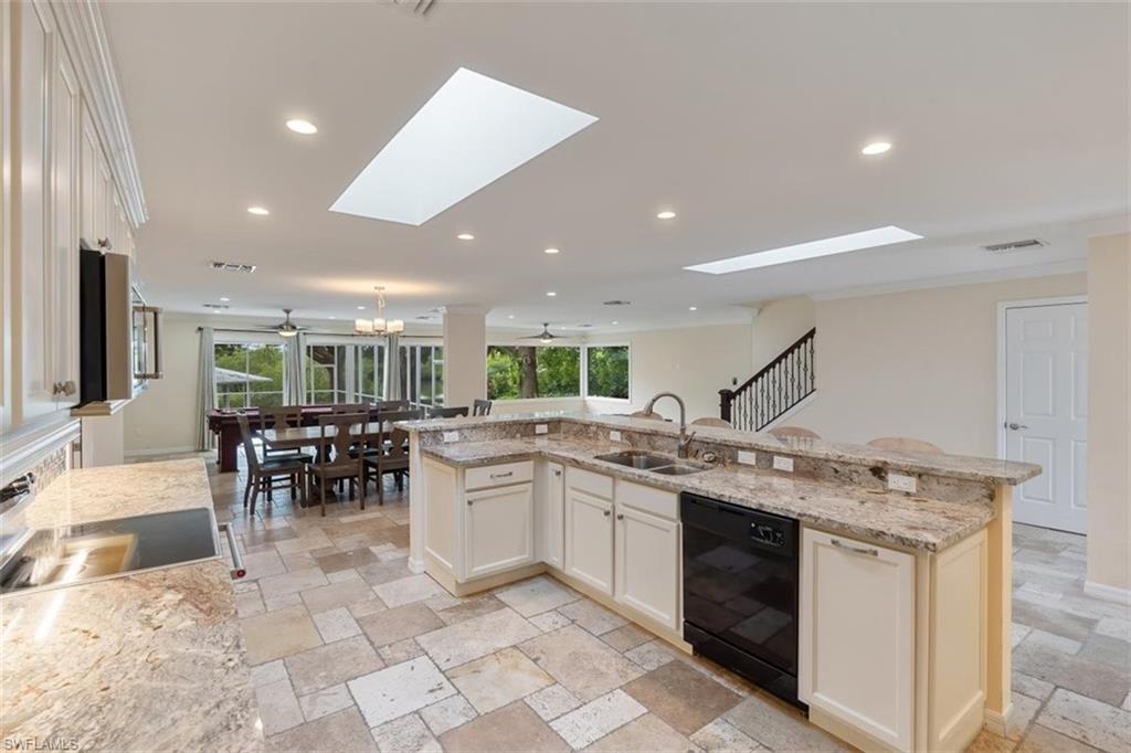 4851 Riverside Drive Estero, FL 33928 - Photo 9 of 35 a kitchen with lots of counter top space
