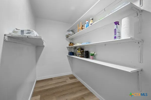 a view of storage and utility room