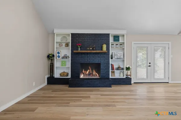 a living room with a fireplace