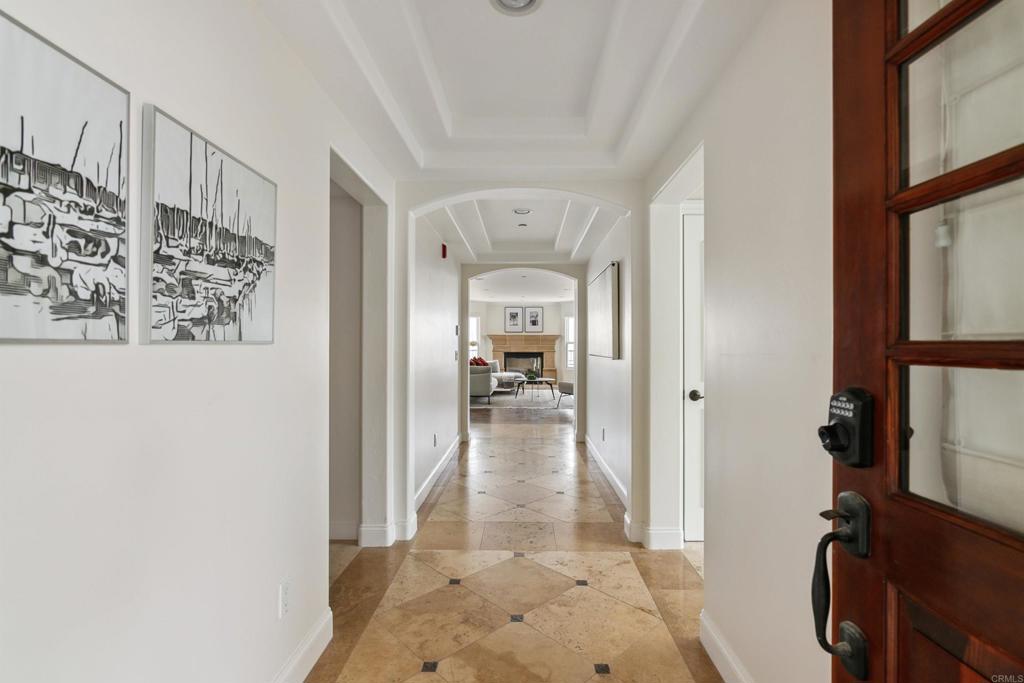 848 Prospect Street, Unit C La Jolla, CA 92037 - Photo 13 of 24 a view of a hallway view with large mirror and window