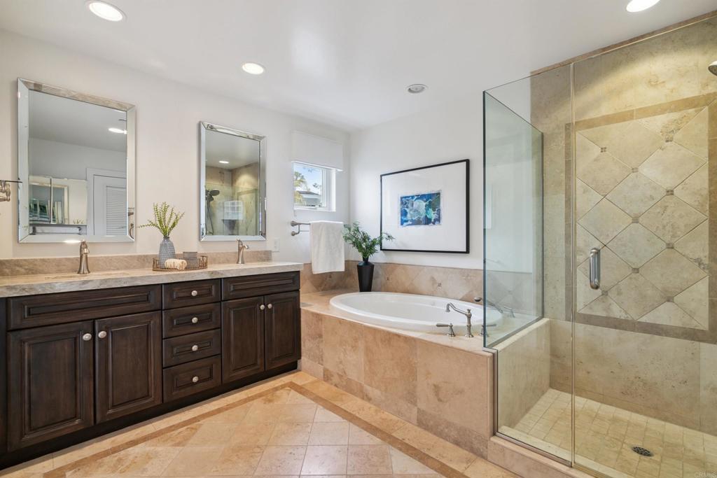 848 Prospect Street, Unit C La Jolla, CA 92037 - Photo 10 of 24 a spacious bathroom with a tub sink shower and mirror