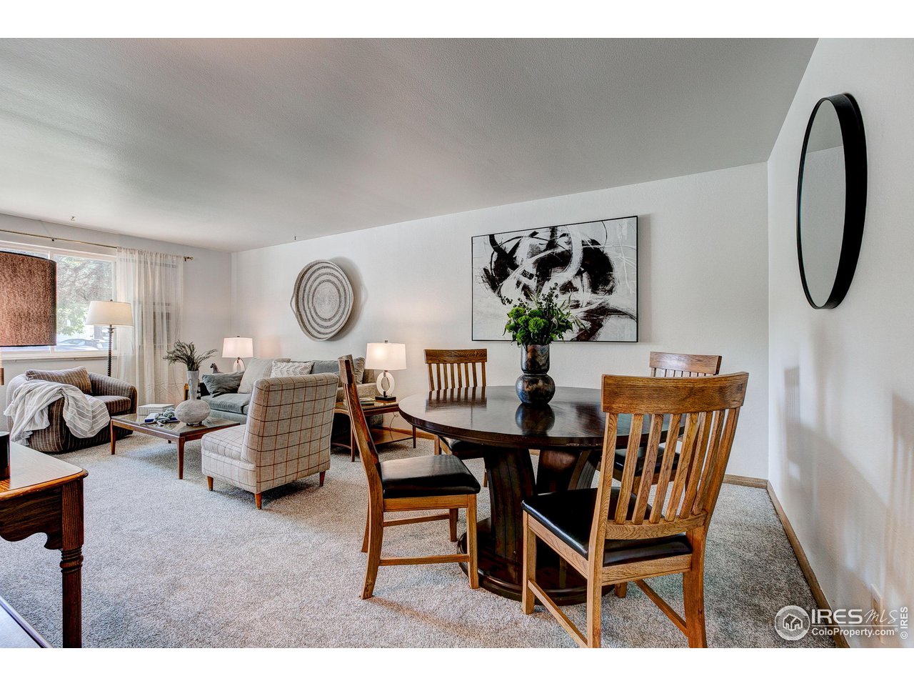 620 West Myrtle Street Fort Collins, CO 80521 - Photo 12 of 30 a dining room with furniture and a large window