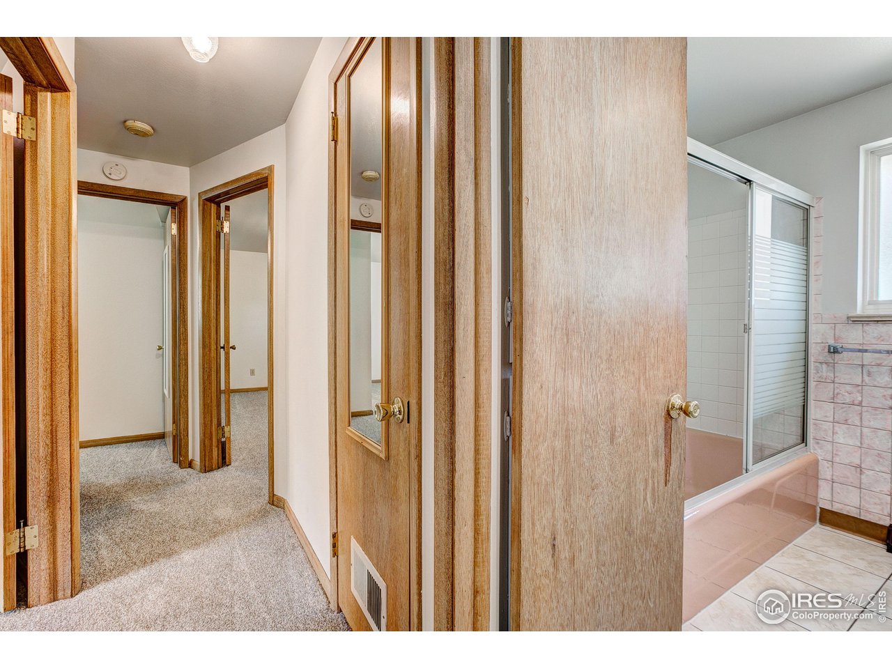 620 West Myrtle Street Fort Collins, CO 80521 - Photo 17 of 30 a view of a bathroom from a hallway